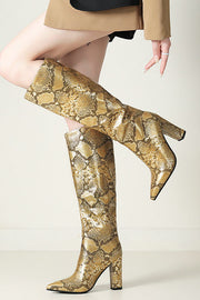 Eve | Goldene Stiefel mit Schlangenleder-Optik – Ein eleganter Hingucker