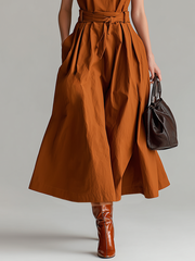 Neckholder-Kleid in Rostrot mit Bindegürtel