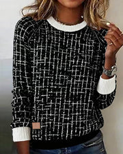 Hanna | Damen Pullover elegant kariert & modern getragen