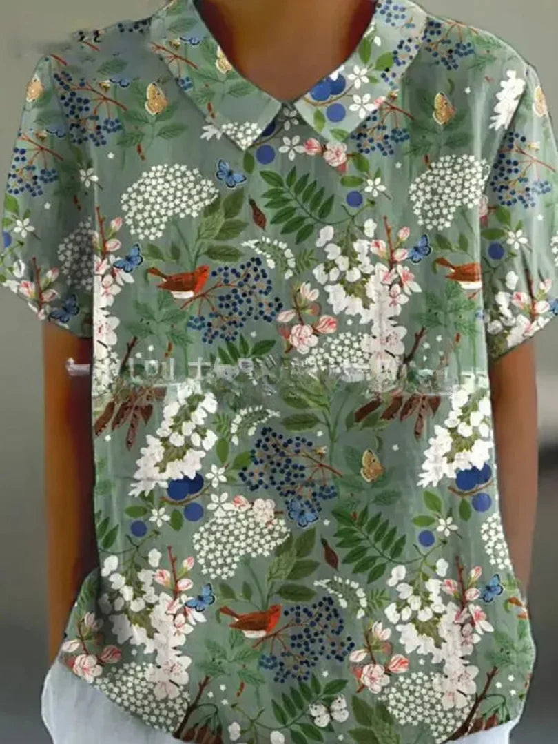 Damen Polo mit floralem Stickmuster und kurzen Ärmeln