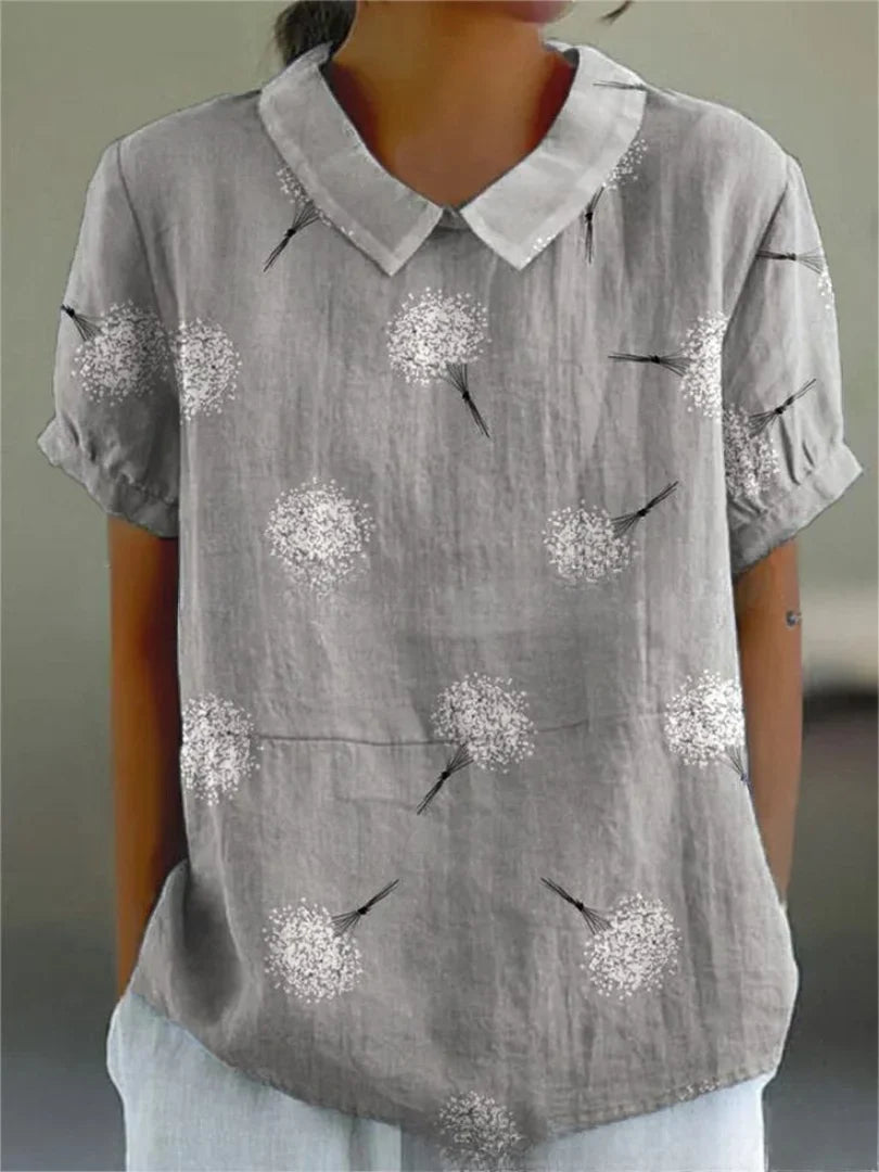 Damen Polo mit floralem Stickmuster und kurzen Ärmeln