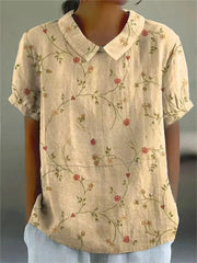 Damen Polo mit floralem Stickmuster und kurzen Ärmeln