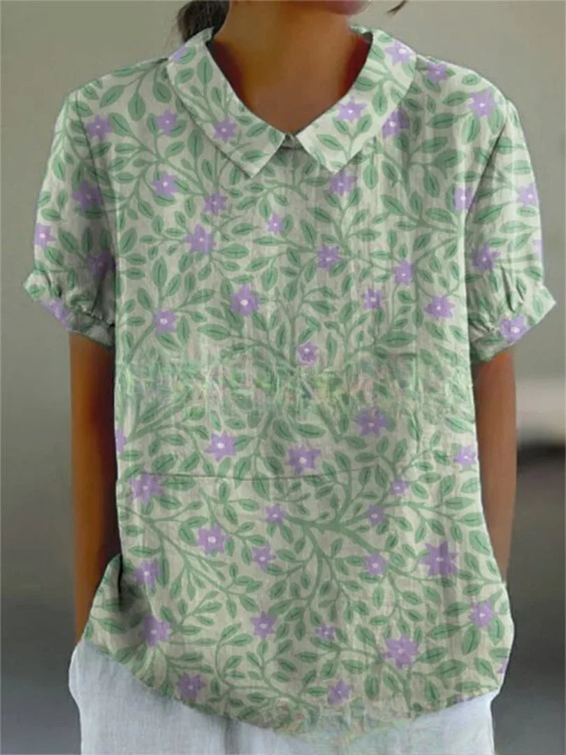 Damen Polo mit floralem Stickmuster und kurzen Ärmeln