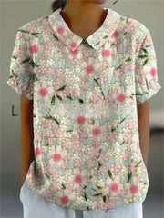 Damen Polo mit floralem Stickmuster und kurzen Ärmeln