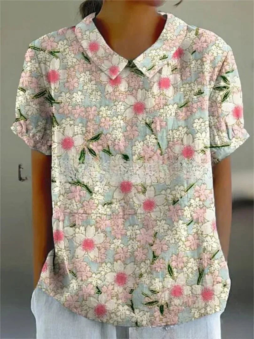 Damen Polo mit floralem Stickmuster und kurzen Ärmeln