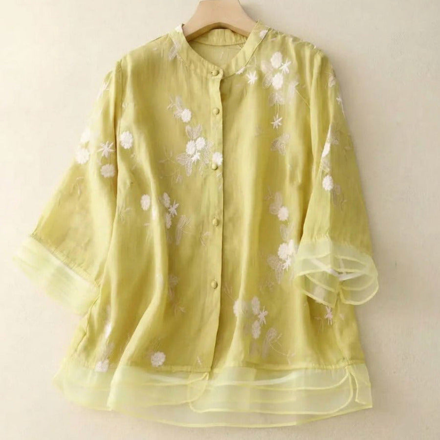 Damen Bluse mit Knopfleiste, Rundhalsausschnitt und floraler Struktur