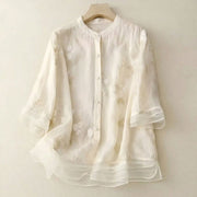 Damen Bluse mit Knopfleiste, Rundhalsausschnitt und floraler Struktur