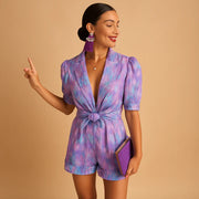 Damen Kurz-Jumpsuit mit Blumenmuster, V-Ausschnitt und Taillengürtel