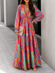 Damen Langarm Maxikleid mit V-Ausschnitt und gestuftem Rock mit Blumenmuster