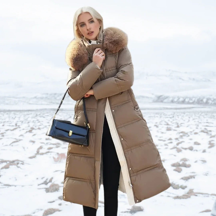 Lange Daunenjacke für Damen mit Kapuze und Kunstfellbesatz