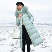 Lange Daunenjacke für Damen mit Kapuze und Kunstfellbesatz