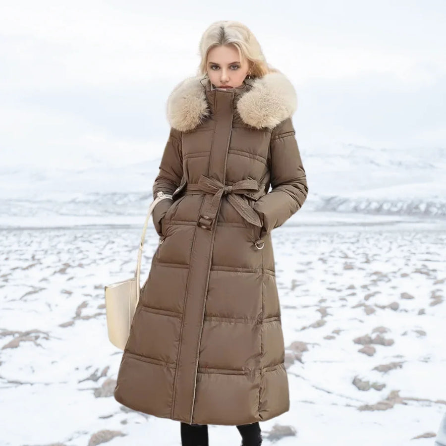 Lange Daunenjacke für Damen mit Kapuze und Kunstfellbesatz