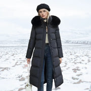 Lange Daunenjacke für Damen mit Kapuze und Kunstfellbesatz