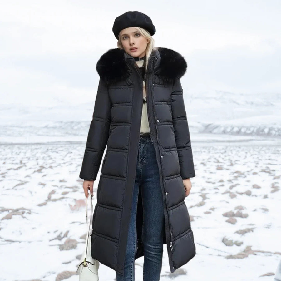 Lange Daunenjacke für Damen mit Kapuze und Kunstfellbesatz