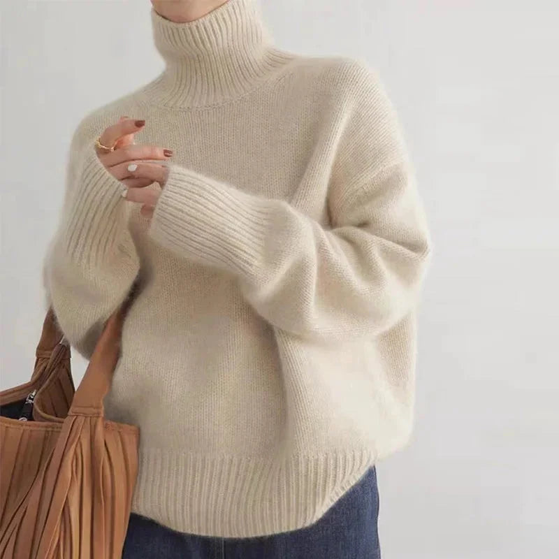 Oversize Damen Rollkragenpullover mit überschnittenen Schultern