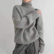 Oversize Damen Rollkragenpullover mit überschnittenen Schultern