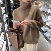 Oversize Damen Rollkragenpullover mit überschnittenen Schultern