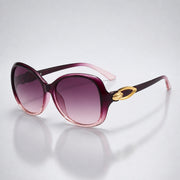 Damen-Sonnenbrille mit Schmetterlingsform und Metallic-Akzenten