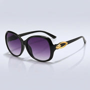 Damen-Sonnenbrille mit Schmetterlingsform und Metallic-Akzenten
