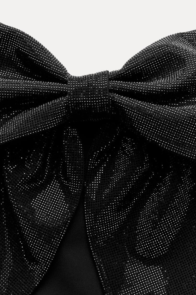 Damen-Top mit Schleifendetail und Glitzer-Struktur