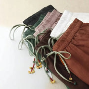 Damenhose mit hohem Bund, geradem Bein, Kordelzug und Seitentaschen