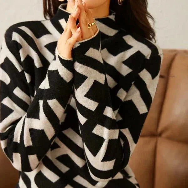 Damenpullover mit geometrischem Muster in Schwarz-Weiß