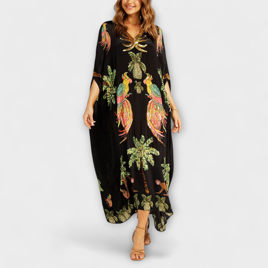 Linda - Elegantes Kleid mit asymmetrischen Schultern und Kokosnussbaum-Muster