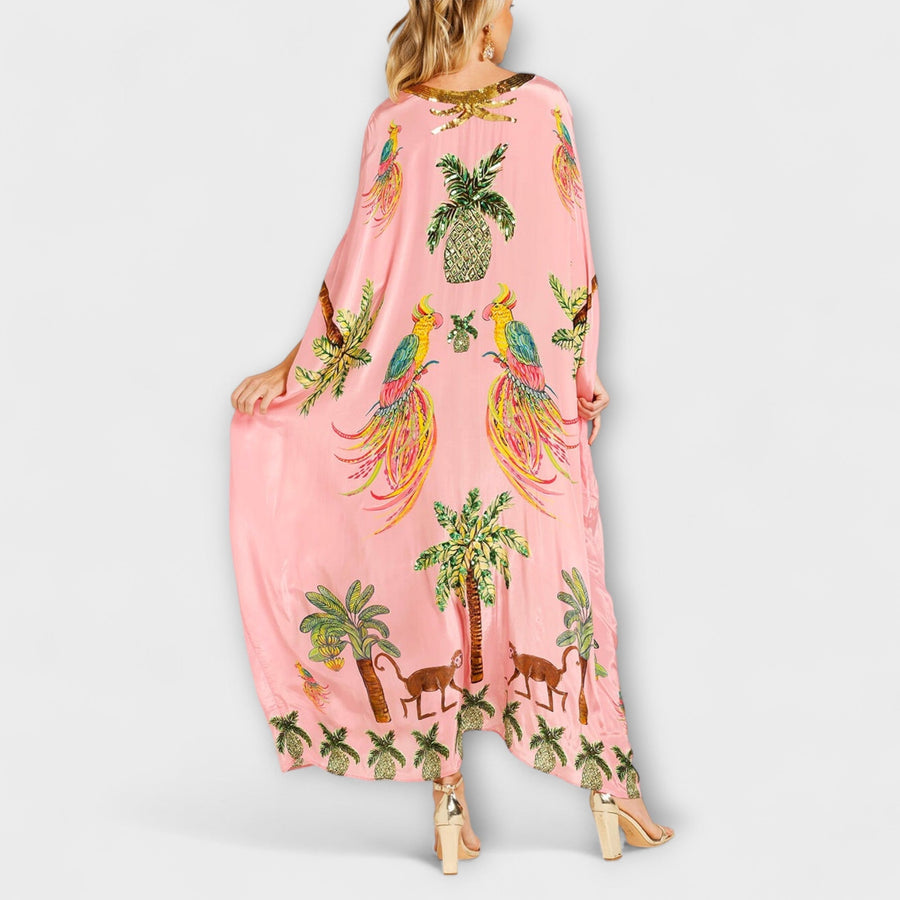 Linda - Elegantes Kleid mit asymmetrischen Schultern und Kokosnussbaum-Muster