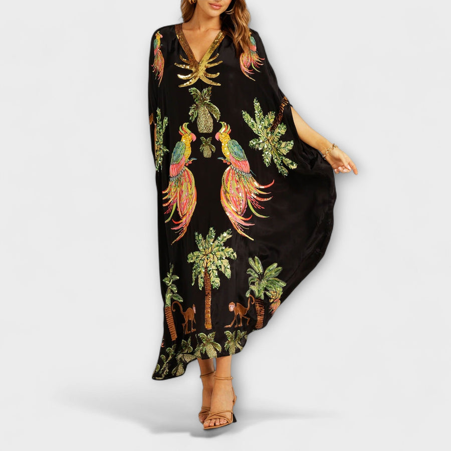 Linda - Elegantes Kleid mit asymmetrischen Schultern und Kokosnussbaum-Muster