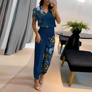 Zweiteiliges Set aus Damenbluse und gemusterter Hose