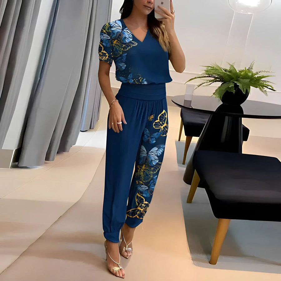 Zweiteiliges Set aus Damenbluse und gemusterter Hose