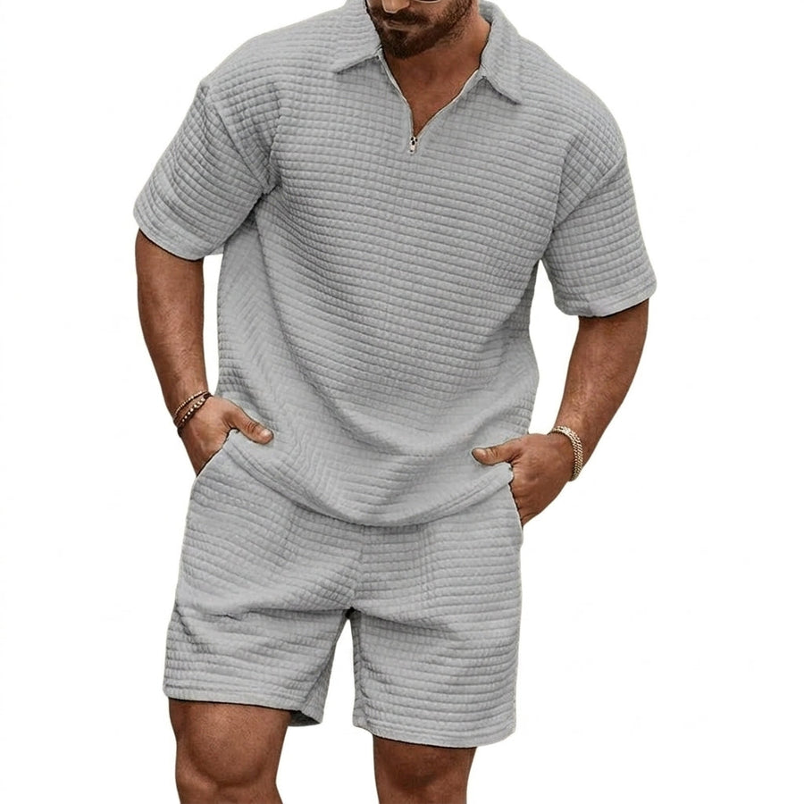 Herren-Set aus Poloshirt mit Viertelreißverschluss und Shorts mit Gitterstruktur