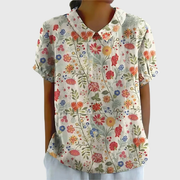 Kurzärmelige Damenbluse mit Blumenmuster und Bubikragen