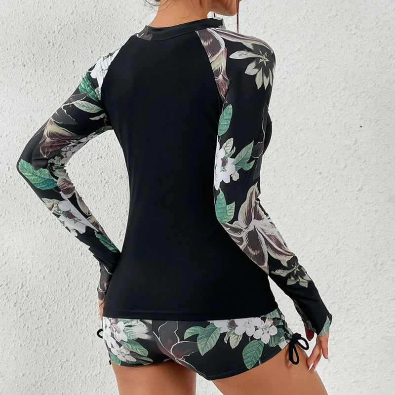 Langärmliger Rashguard-Badeanzug mit Frontreißverschluss und Blumenmuster für Damen