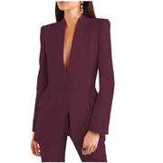 Zweiteiliges Damenkostüm aus Blazer mit fallendem Revers und Hose