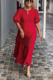 "Natalia | Zeitloses Eleganzkleid" could be rewritten as "Natalia | Klassisches Eleganzkleid".
